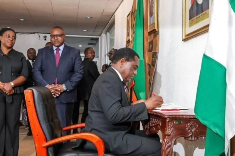 The President of the Republic of Zambia, His Excellency, Hakainde Hichilema signs the book of condol…